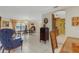 Spacious dining area with a view into the kitchen and living room at 2218 Shadow Oaks Rd, Sarasota, FL 34240