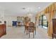 Formal dining room features beautiful window views and space to entertain guests at 2218 Shadow Oaks Rd, Sarasota, FL 34240