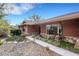 Attractive single-story home with stone accents and a welcoming front entrance at 2218 Shadow Oaks Rd, Sarasota, FL 34240