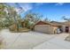 Spacious two-car garage and long driveway with ample parking for multiple vehicles at 2218 Shadow Oaks Rd, Sarasota, FL 34240