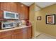 Kitchen with stainless steel appliances, granite countertops, and plenty of storage space at 2218 Shadow Oaks Rd, Sarasota, FL 34240