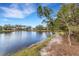 Serene lake view from lakeside property at 2218 Shadow Oaks Rd, Sarasota, FL 34240