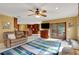 Bright living room with hardwood floors and access to backyard patio at 2218 Shadow Oaks Rd, Sarasota, FL 34240