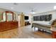 Light-filled main bedroom with wood floors and spacious layout at 2218 Shadow Oaks Rd, Sarasota, FL 34240