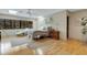 Main bedroom with hardwood floors and large windows at 2218 Shadow Oaks Rd, Sarasota, FL 34240