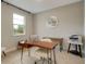 Bright home office features a wood desk and natural light at 2692 Mctague St, North Port, FL 34291