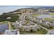 Aerial view of community near the coast with golf course at 2906 Captains Ct, Palmetto, FL 34221