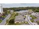 Aerial view showcasing a villa with water access and parking at 2906 Captains Ct, Palmetto, FL 34221