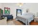 Spacious bedroom with king-size bed and sitting area at 2906 Captains Ct, Palmetto, FL 34221