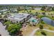 Community clubhouse with pool and tennis courts at 2906 Captains Ct, Palmetto, FL 34221