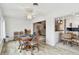 Bright dining area with table and chairs, open to living room and kitchen at 2906 Captains Ct, Palmetto, FL 34221