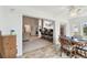 Dining area with table and chairs, open to living room and kitchen at 2906 Captains Ct, Palmetto, FL 34221