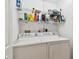 Laundry room with washer, dryer, and shelving at 2906 Captains Ct, Palmetto, FL 34221