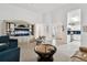 Open living room with views into kitchen and access to other rooms at 2906 Captains Ct, Palmetto, FL 34221