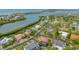 Aerial view of a house with a pool, nestled in a waterfront community at 3318 Bayou Sound, Longboat Key, FL 34228