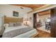 Cozy bedroom with sliding doors opening to a dining area at 3318 Bayou Sound, Longboat Key, FL 34228