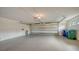 Spacious garage with ample storage space and overhead door at 3318 Bayou Sound, Longboat Key, FL 34228