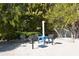 Community grilling area with multiple grills nestled among lush landscaping at 3318 Bayou Sound, Longboat Key, FL 34228