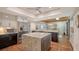 Modern kitchen boasts granite counters, stainless steel appliances, and an island at 3318 Bayou Sound, Longboat Key, FL 34228