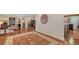 Spacious living room with hardwood floors, area rug, and large windows at 3318 Bayou Sound, Longboat Key, FL 34228