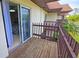 Private balcony with wooden deck overlooking the community at 3333 Ramblewood Ct, Sarasota, FL 34237