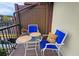Private balcony with seating and view of the community at 3333 Ramblewood Ct, Sarasota, FL 34237