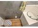 Updated bathroom with glass sink and patterned tile at 3333 Ramblewood Ct, Sarasota, FL 34237