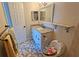 Updated bathroom with granite countertop and stylish tile at 3333 Ramblewood Ct, Sarasota, FL 34237