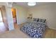 Cozy bedroom with a double bed and en-suite bathroom at 3333 Ramblewood Ct, Sarasota, FL 34237