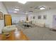 Spacious community room with comfortable seating and large windows at 3333 Ramblewood Ct, Sarasota, FL 34237