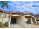 Front view of charming condo with private balcony and carport at 3333 Ramblewood Ct, Sarasota, FL 34237