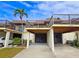 Front view of the property showing parking and balconies at 3333 Ramblewood Ct, Sarasota, FL 34237