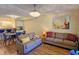 Open living room and kitchen with hardwood floors and modern decor at 3333 Ramblewood Ct, Sarasota, FL 34237