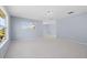 Bedroom with carpet flooring, window with blinds and neutral walls at 408 Golden Harbour Trl, Bradenton, FL 34212