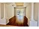 Elegant dining room with hardwood floors and columns at 408 Golden Harbour Trl, Bradenton, FL 34212