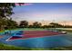 Outdoor games area with cornhole and shuffleboard at 408 Golden Harbour Trl, Bradenton, FL 34212