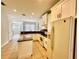 Modern kitchen with granite countertops and white cabinetry at 408 Golden Harbour Trl, Bradenton, FL 34212