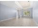 Bright and spacious living room with tile floors and recessed lighting at 408 Golden Harbour Trl, Bradenton, FL 34212