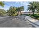 Residential entrance with lush landscaping at 4216 Central Sarasota Pkwy # 1326, Sarasota, FL 34238