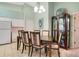 Dining area with table and chairs, adjacent to kitchen at 4216 Central Sarasota Pkwy # 1326, Sarasota, FL 34238