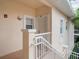 Exterior view of condo building with stairs and entrance at 4216 Central Sarasota Pkwy # 1326, Sarasota, FL 34238