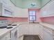 Bright kitchen features white cabinets, and a full suite of appliances at 4216 Central Sarasota Pkwy # 1326, Sarasota, FL 34238