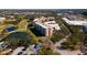 Aerial view of condo building near golf course at 4570 Pinebrook Cir # 303, Bradenton, FL 34209