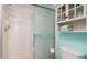 Bright bathroom with a shower stall and a built-in shelf at 4570 Pinebrook Cir # 303, Bradenton, FL 34209