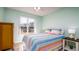 Spacious bedroom with large window and wood flooring at 4570 Pinebrook Cir # 303, Bradenton, FL 34209