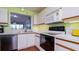 Updated kitchen with modern appliances and cabinetry at 4570 Pinebrook Cir # 303, Bradenton, FL 34209