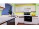 Efficient kitchen features updated appliances and ample counter space at 4570 Pinebrook Cir # 303, Bradenton, FL 34209