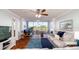 Spacious living room with a view and comfy seating at 4570 Pinebrook Cir # 303, Bradenton, FL 34209
