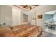 Bedroom with a ceiling fan with ensuite bathroom view at 4802 51St W St # 1118, Bradenton, FL 34210