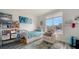 Well-organized bedroom with a twin bed, cozy chair, and ample storage options at 4802 51St W St # 1118, Bradenton, FL 34210